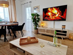Ferienwohnung Sonnenhang im Boho-Stil mit Balkon